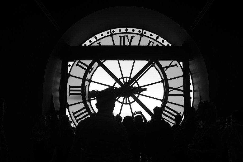 Tourists inside a clock.